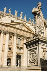 Fototapeta na wymiar Vatican Saint Peter Facade and Saint Peter Statue