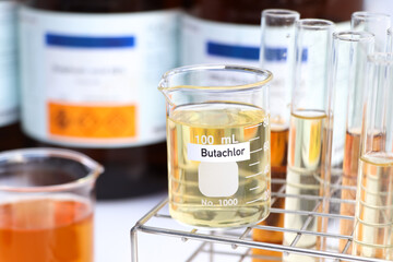 Butachlor in glass, Herbicides are used to manage wasteland or control weeds in agriculture