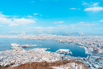 Beautiful landscape and cityscape from Hakodate Mountain with Snow in winter season. landmark and popular for attractions in Hokkaido, Japan.Travel and Vacation concept