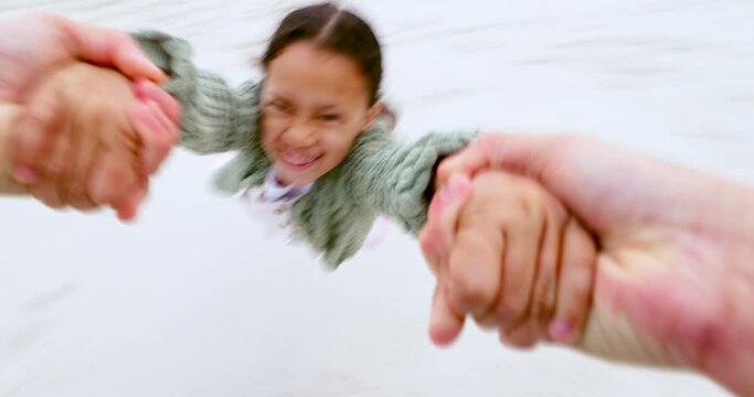 Child, pov and swinging from hands at the beach with a parent in fun game. Face, smile and girl swing or playing with mom or dad and bonding with freedom or happiness on summer holiday or vacation