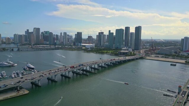 Aerial forward shot of Miami Macarthur Causeway Bridge to the beach, Florida, USA