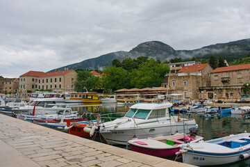 Fototapeta na wymiar The waterfront harbour area in Bol town on Brac Island, Croatia. May