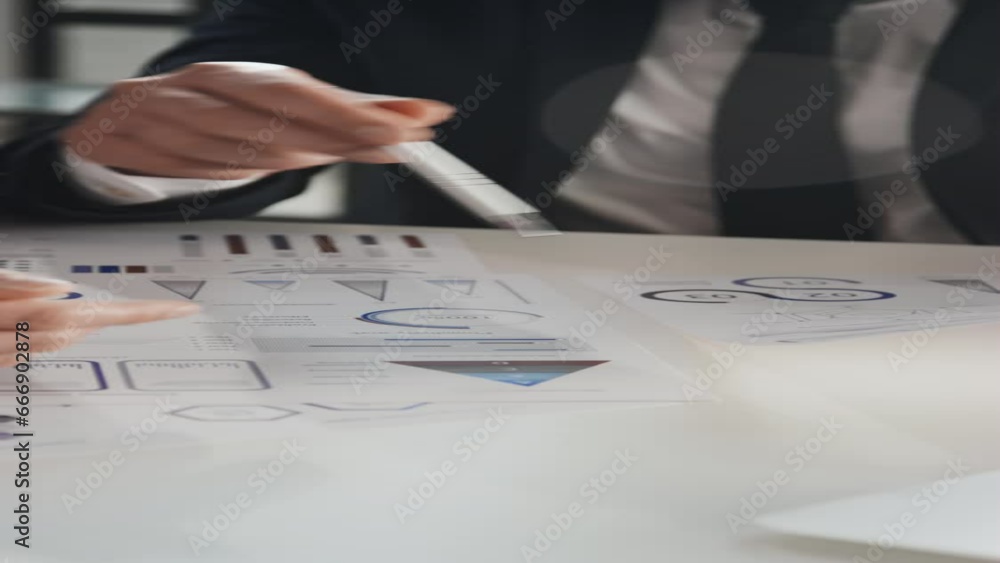 Poster vertical slowmo shot of two unrecognisable businessmen comparing two documents with statistical data