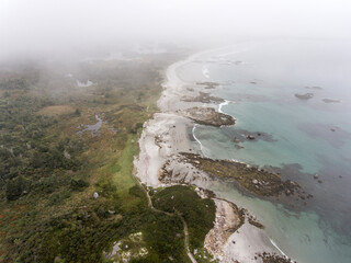 Exploring the beach in the mist morning at Kejimkujik National Park Seaside, Nova Scotia, Canada