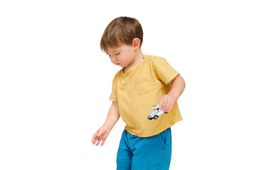 Baby is happily picking up and collecting his toys for cleaning, isolated on white background. Kid...