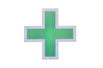 Green cross pharmacy signs on the wall of a city house, isolated on white background