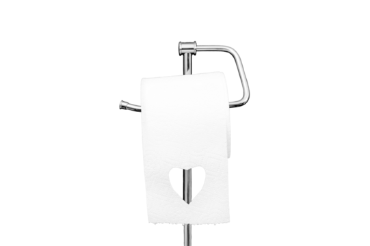 Heart carved in toilet paper, copy space for text, isolated on a white background. Toilet paper on a black stone wall background