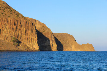 Fototapeta na wymiar Cliffs and coves in Isleta del Moro village in Almeria