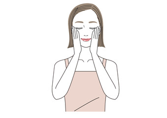 両手を頬にあてて目をとじて微笑んでいる女性