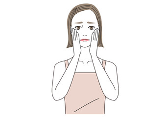 両手を頬にあてて悩んでいる表情の女性