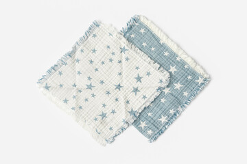 Muslin blanket with star pattern on white background