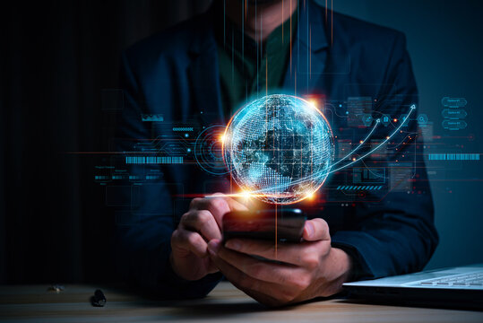 Businessman hand holding the earth global virtual shown corporate future growth year 2023 to 2024. New Goals with Plans and Visions for Next Year 2024, Opportunity, challenge and business strategy.