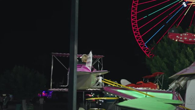 Kids having extreme fun in amusement park roller coaster