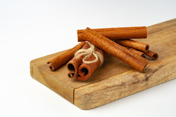 Cinnamon sticks isolated on white background close up