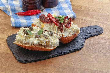 bruschetta with soft cheese capers and tomato