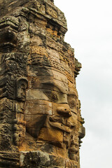 Huge stone face, Bayon Temple, Angkor Wat complex, UNESCO Site, Cambodia