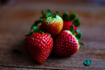 Strawberries On A Wooden Table