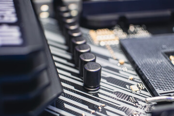 Motherboard with microchips and resistors, desktop PC close-up. Computer hardware chipset...