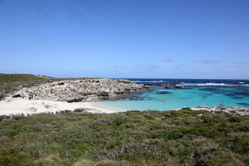 Beautiful coastal image of Rottnest Island off the West Australian coast.  Showing clear water, waves, limestone rocks and vegetation