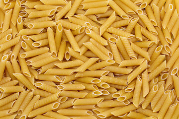 
Penne italian pasta as background