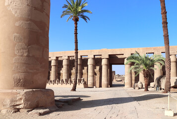 Ancient column and ram-headed sphinxes in so-called Ethiopian court, Karnak temple complex, Luxor,...