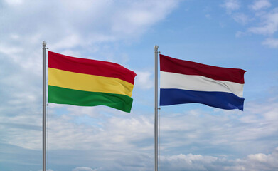 Netherlands and Bolivia flags, country relationship concept