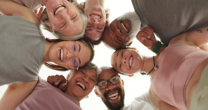 Fitness, face and friends in a circle low angle for team, sports and collaboration support outdoor. exercise, portrait and group of people from below hug, smile and excited with workout motivation