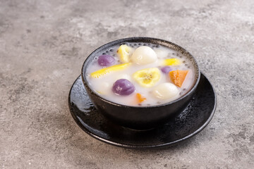 Ginataang Bilo Bilo or Ginataang Halo Halo is a Popular Filipino Dessert, Made with Glutinous Rice Balls, Bananas, sweet Potatoes and Tapioca Pearls Cookes in Sweet Coconut Milk.