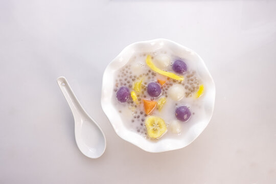 Ginataang Bilo Bilo or Ginataang Halo Halo is a Popular Filipino Dessert, Made with Glutinous Rice Balls, Bananas, sweet Potatoes and Tapioca Pearls Cookes in Sweet Coconut Milk.