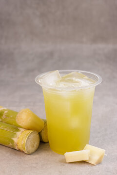 Es Tebu or Fresh Squeezed Sugar Cane Juice with Fresh Sugar Cane.