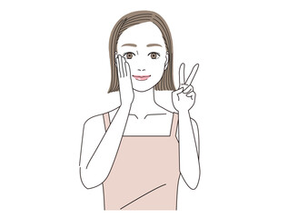 頬に手をあてて笑顔でVサインをしているきれいな女性