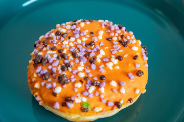 Plate for delicious donuts for Halloween on table
