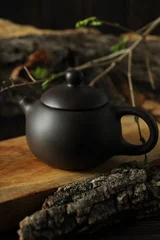 Foto op Aluminium Asian tea concept, teapot on dark background. © Atlas