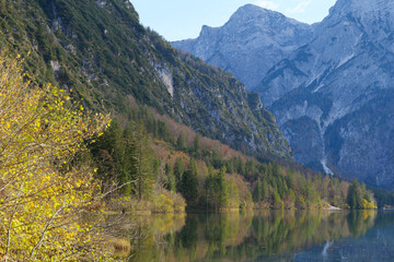 Mountain Lake and Trees on a Sunny Autumn Day with Blue Sky