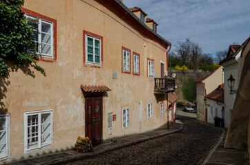 Fototapeta na wymiar Novy Svet, a historical colorful street of Hradcany in Prague, the Czech Republic