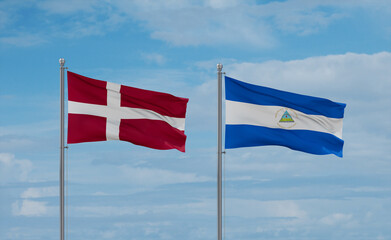 Nicaragua and Denmark flags, country relationship concept