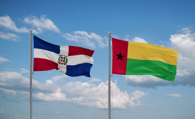 Guinea-Bissau and Dominican flags, country relationship concept