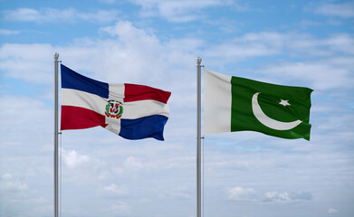 Pakistan and Dominican flags, country relationship concept
