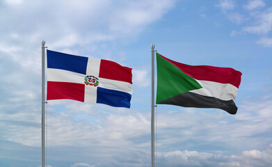 Sudan and Dominican flags, country relationship concept