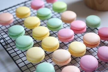 Obraz premium macaron shells cooling on a wire rack