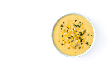 Corn soup in green bowl isolated on white background. Top view. Copy space