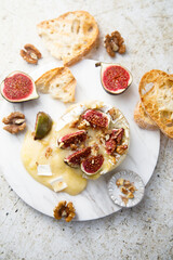 Baked camembert cheese with figs and honey