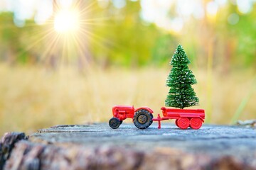 Toy Tractor with Christmas Tree and Sun