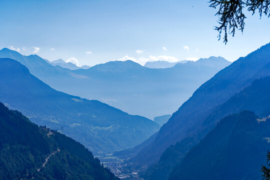 Scenic view of mountain village Airolo with Leventina Valley in the Swiss Alps on a sunny late summer day. Photo taken September 10th, 2023, Gotthard, Canton Ticino, Switzerland.