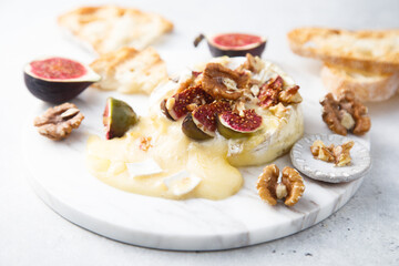 Baked camembert cheese with figs and honey