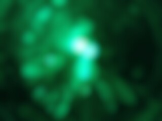 Abstract blur background image of green color gradient used as an illustration. Designing posters or advertisements.