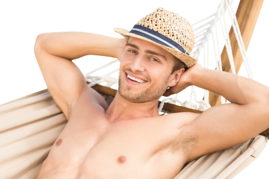 Digital png photo of happy caucasian shirtless man lying on hammock on transparent background - Powered by Adobe