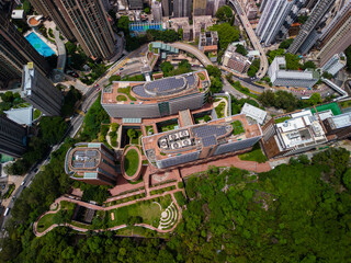 Aerial view of Hong Kong university with its rooftop garden and solar panel system - 667007483