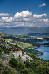 Fototapeta na wymiar Aerial view of salt lake of Slano and house on the coast.. Beautiful summer landscape, travel to Balkan