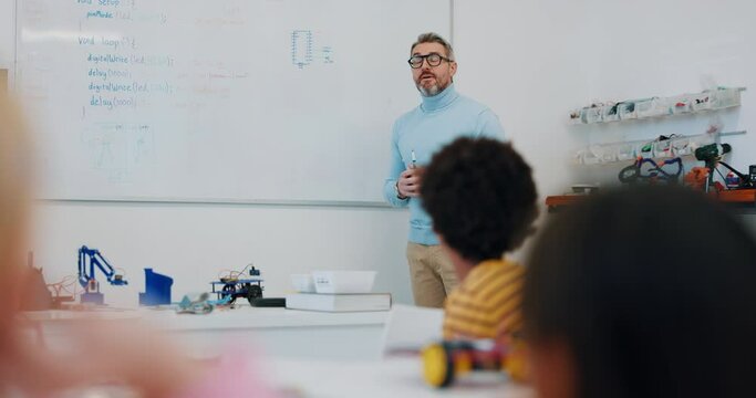 Kid, question and teacher in science classroom, school or physics education with students learning lesson discussion. Teaching, chemistry and listening to child asking, why or talk about knowledge